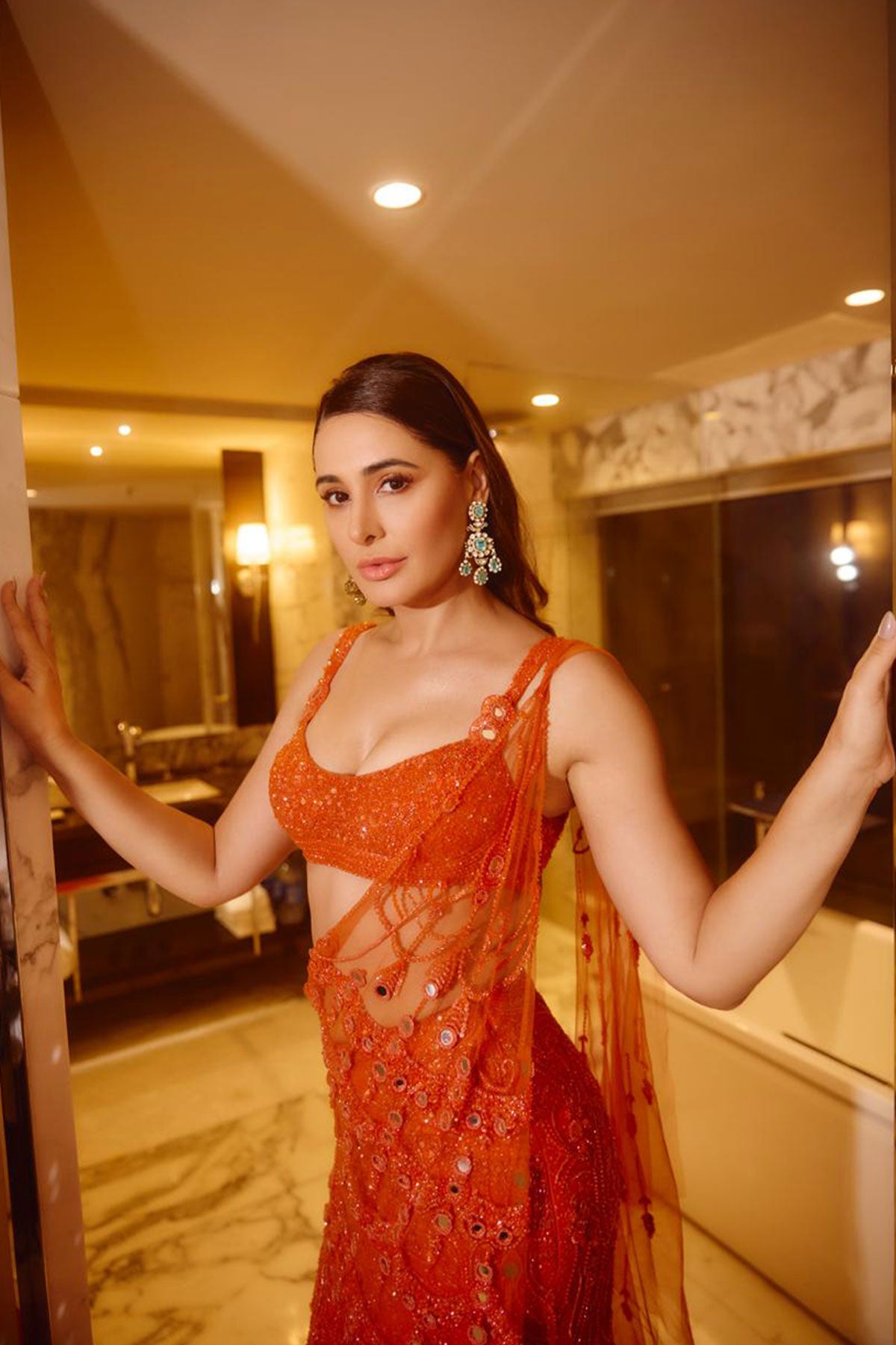 Nargis Fakhri in Molten Sunset Drape Saree